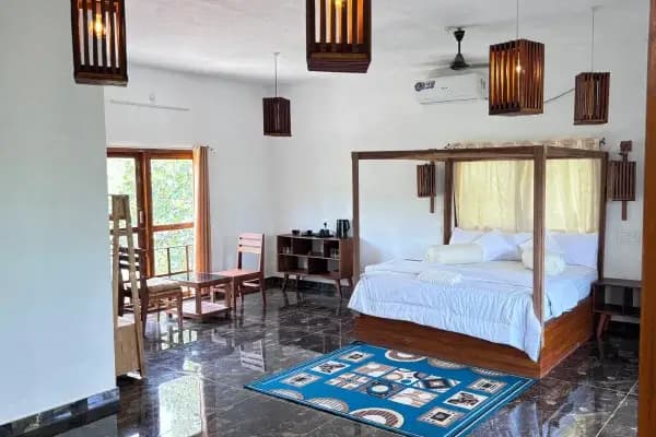 Peaceful guest room at the Kerala yoga retreat