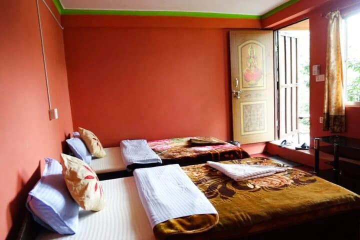 Comfortable yoga accommodation room at Pure Soul Yoga School