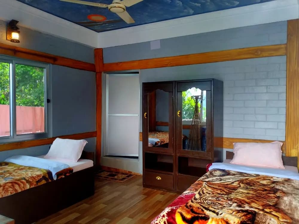 Neat and relaxing retreat room at Pure Soul Yoga School Nepal