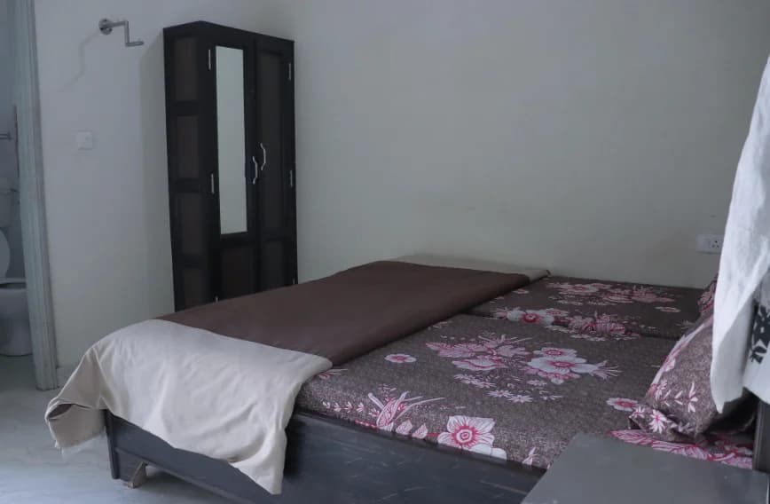 Comfortable yoga accommodation room at Pure Soul Yoga School
