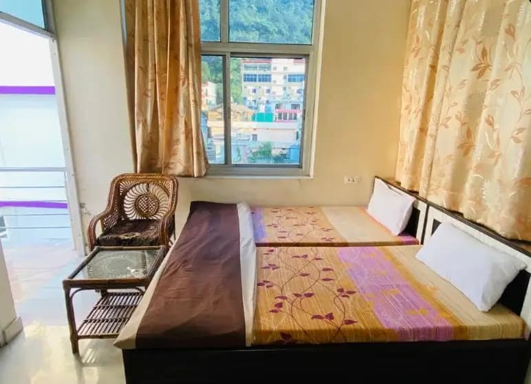 Clean student accommodation room with comfortable bedding